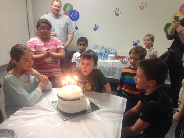 Birthday at Bouncin' Bears.  Yes, the cake is a Storm Trooper head.